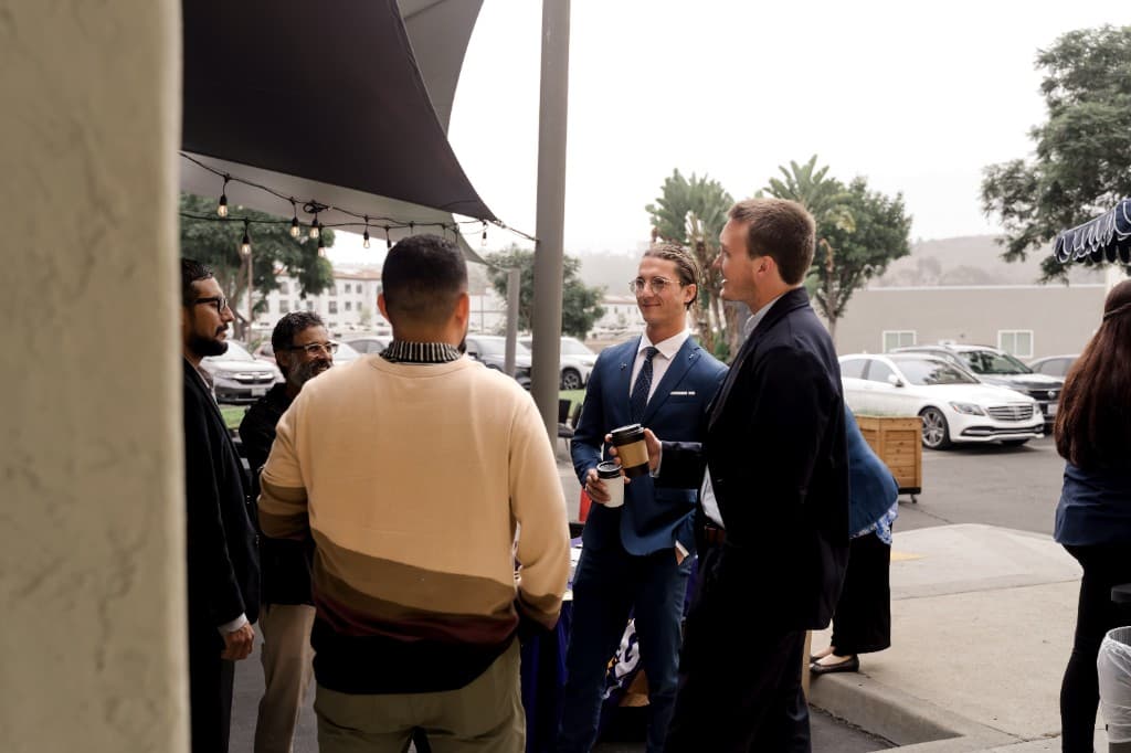 Aspire advisors in conversation outdoors